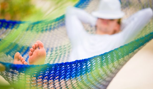 lazy-time-man-in-hat-in-a-hammock-on-a-summer-day-2023-11-27-04-52-27-utc